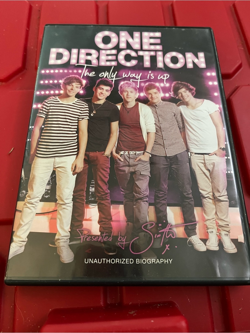 1D One Direction Biography DVD — Pink, Black